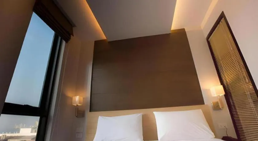 Bed in P.72 Hotel