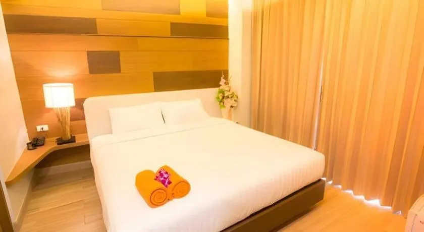 Bed in P.72 Hotel