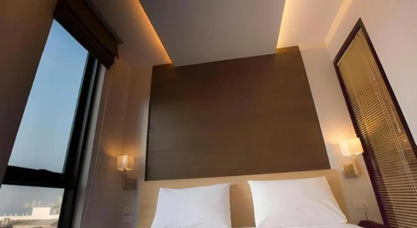 Bed in P.72 Hotel