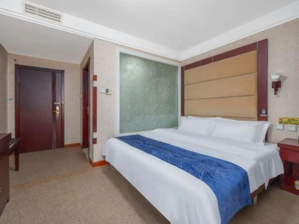 Bed in Weihai Huayu Business Hotel