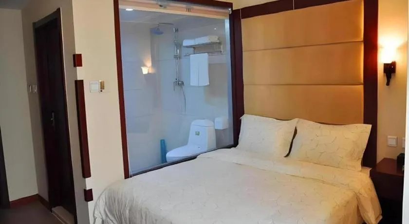 Bed in Weihai Huayu Business Hotel