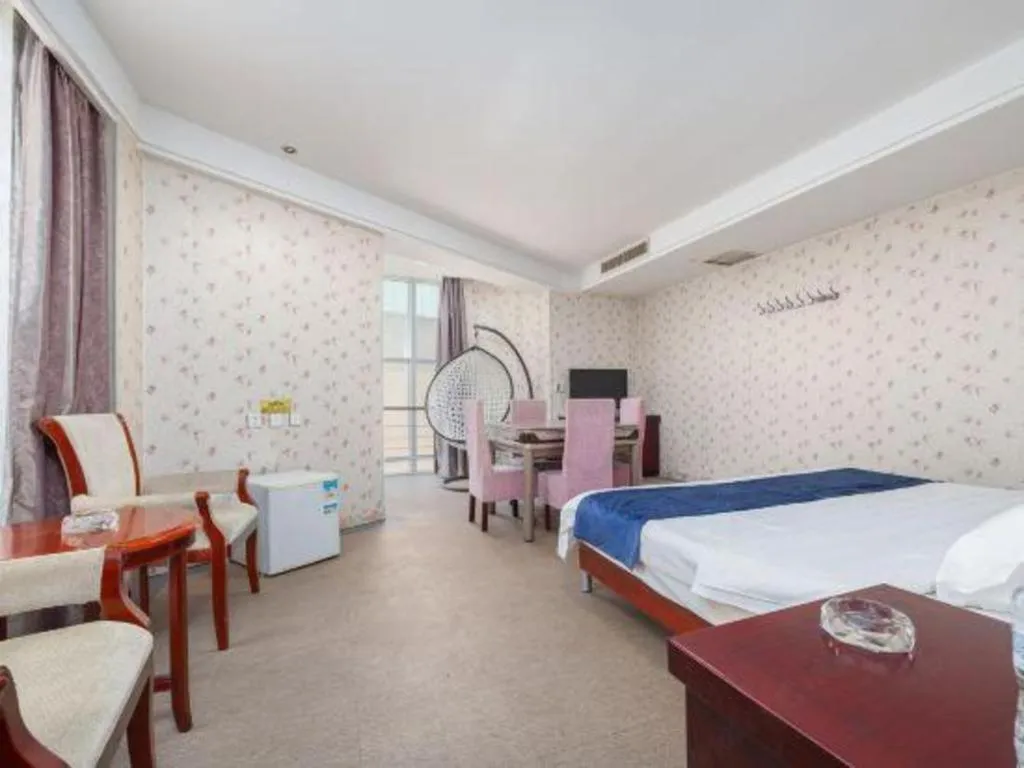 Bed in Weihai Huayu Business Hotel