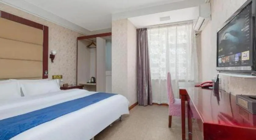 Bed in Weihai Huayu Business Hotel