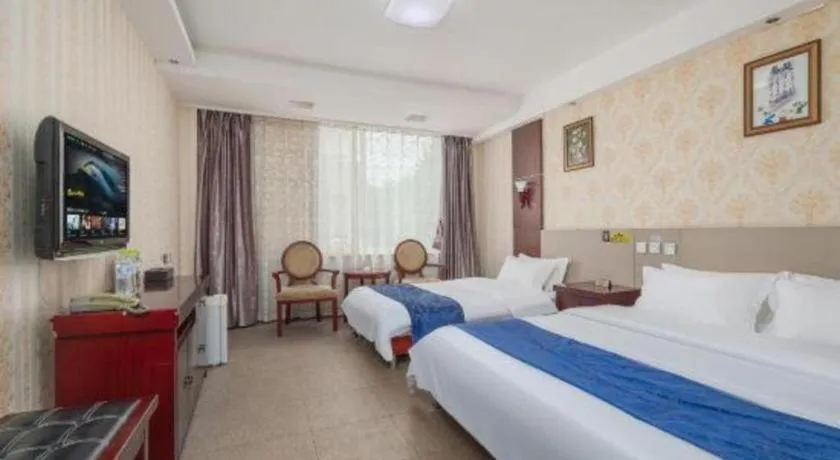 Bed in Weihai Huayu Business Hotel