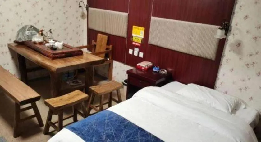 Bed in Weihai Huayu Business Hotel