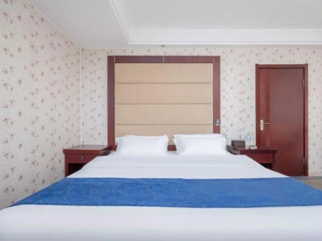 Bed in Weihai Huayu Business Hotel