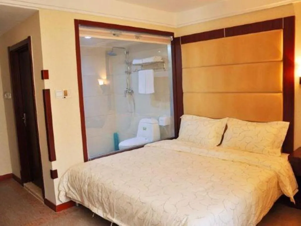 Bed in Weihai Huayu Business Hotel