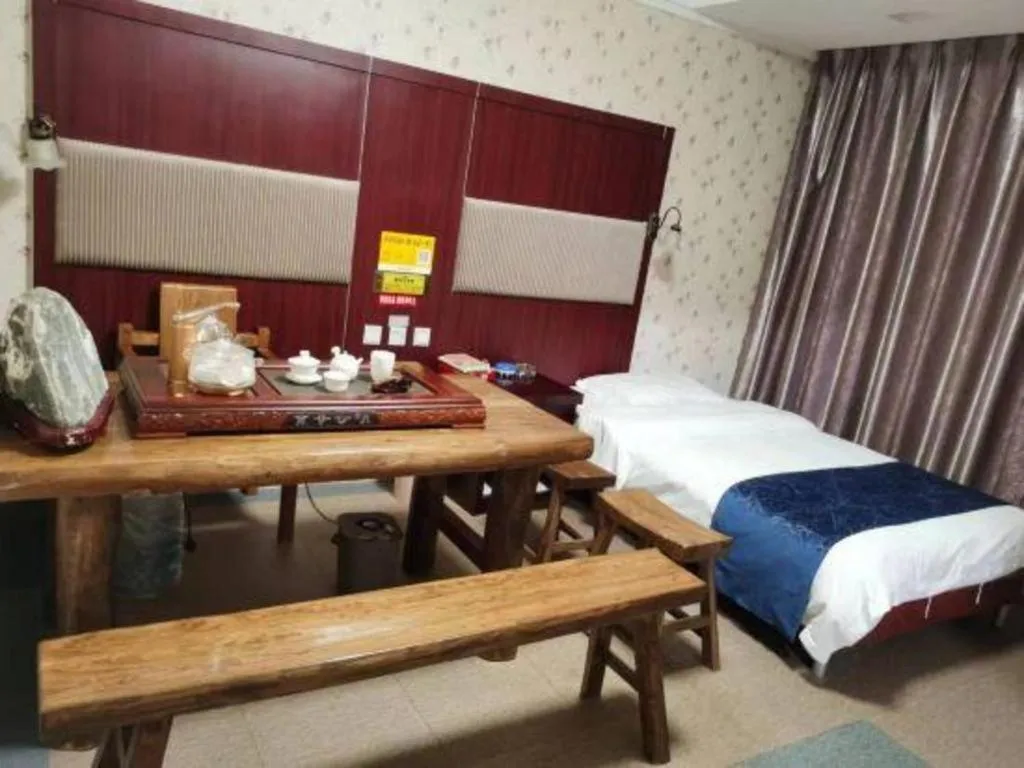 Bed in Weihai Huayu Business Hotel