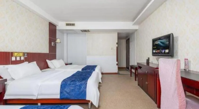 Bed in Weihai Huayu Business Hotel