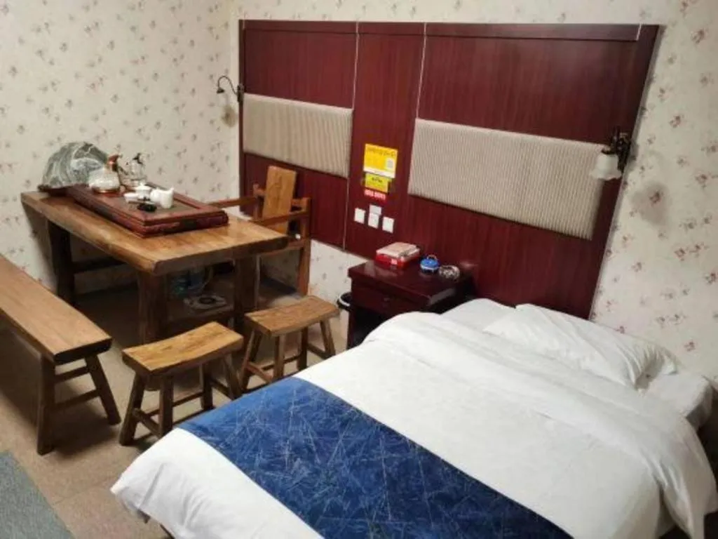 Bed in Weihai Huayu Business Hotel