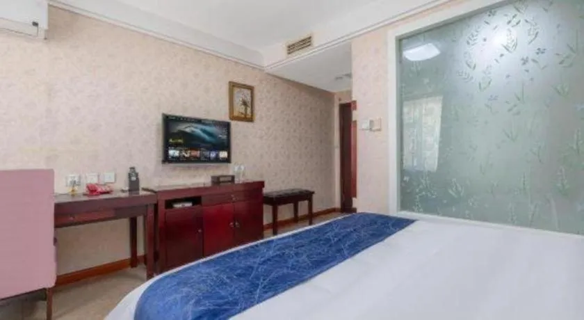Bed in Weihai Huayu Business Hotel