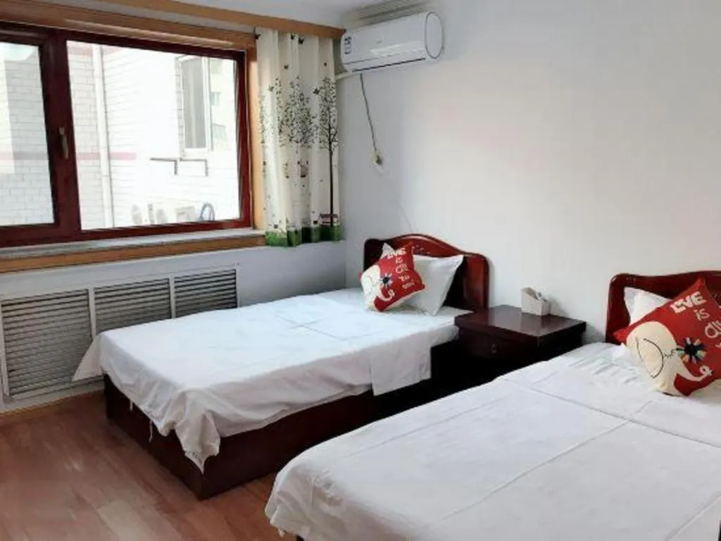 Bed in Weihai Huayu Business Hotel
