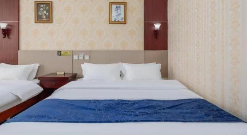 Bed in Weihai Huayu Business Hotel