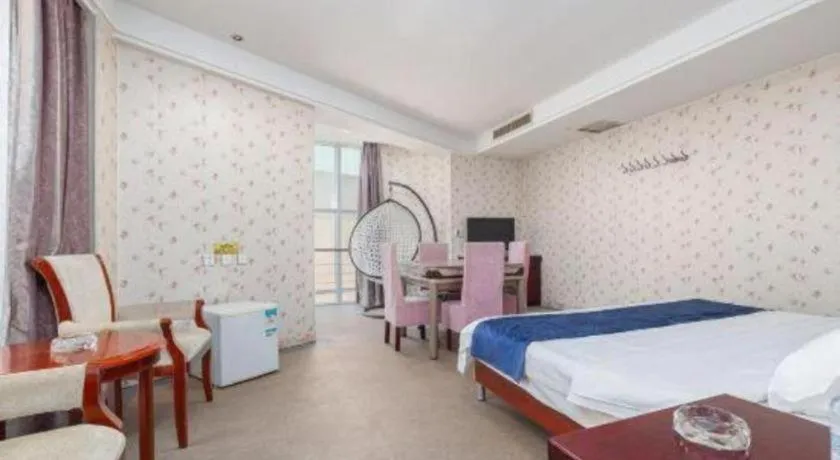 Bed in Weihai Huayu Business Hotel