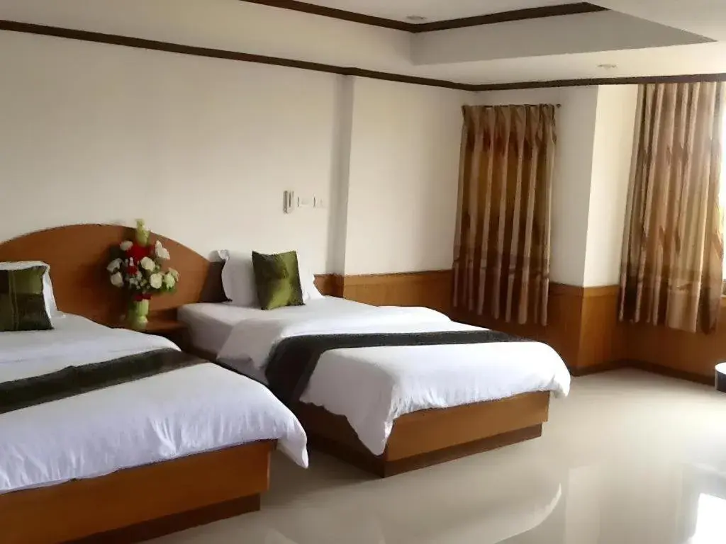 Bed in PC Palace Hotel Bed in PC Palace Hotel