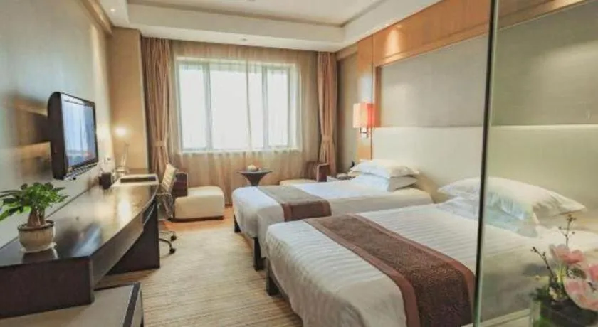 Bed in Huzhou Zhebei Hotel