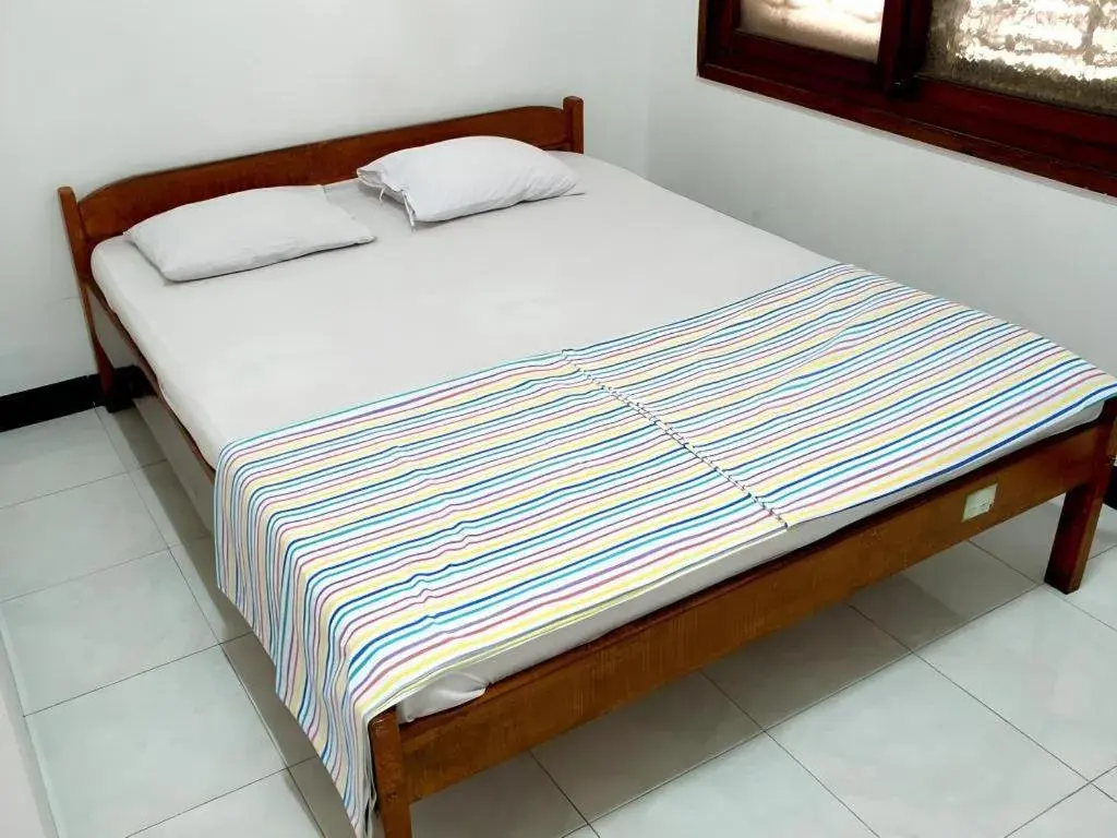 Bed in Hotel Wijaya Magelang Bed in Hotel Wijaya Magelang