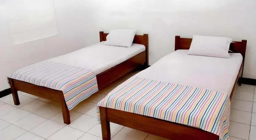 Bed in Hotel Wijaya Magelang
