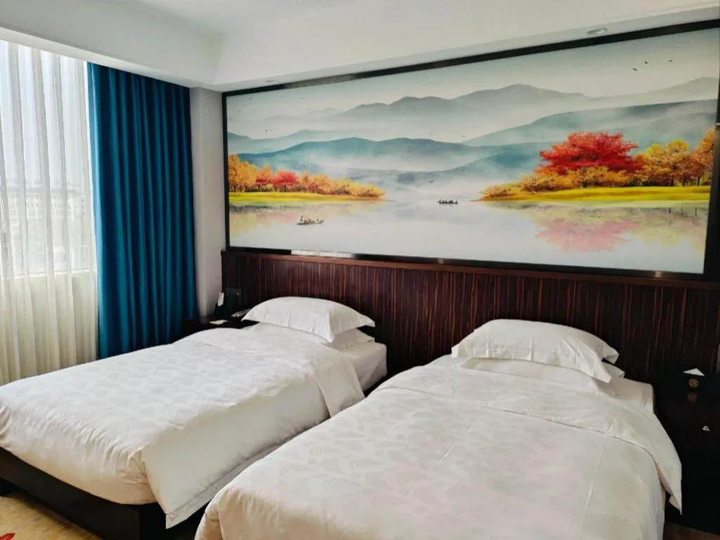 Bed in Centenio International Hotel