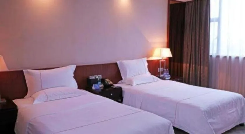 Bed in Centenio International Hotel