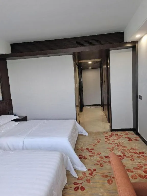 Bed in Centenio International Hotel