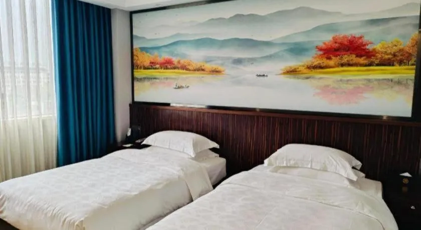 Bed in Centenio International Hotel