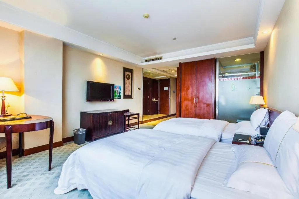 Bed in Centenio International Hotel