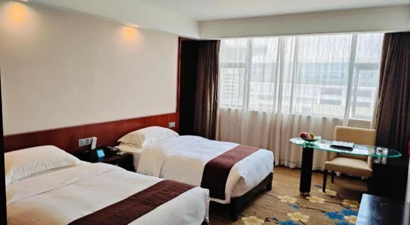 Bed in Centenio International Hotel