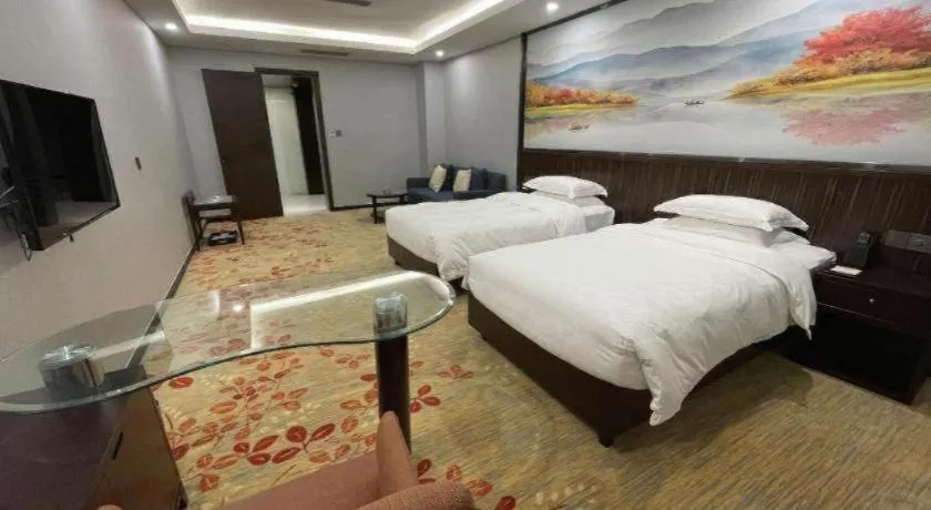 Bed in Centenio International Hotel