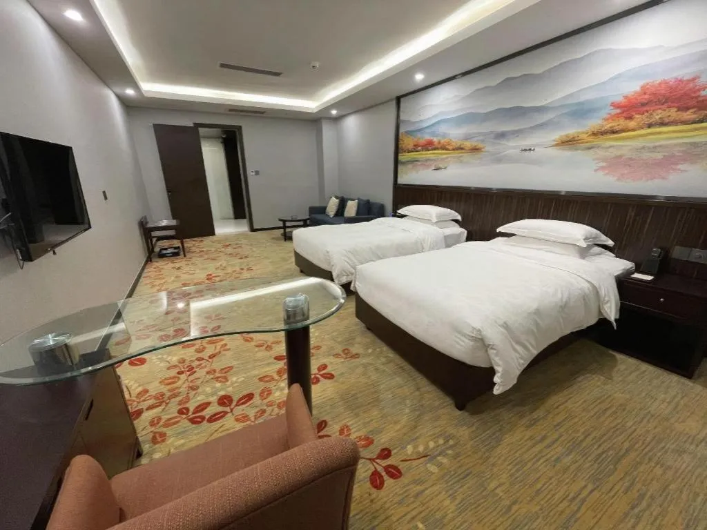 Bed in Centenio International Hotel