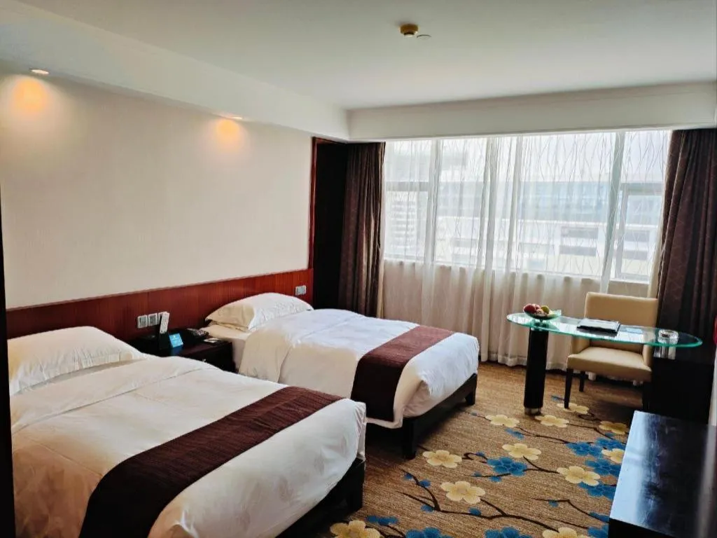 Bed in Centenio International Hotel