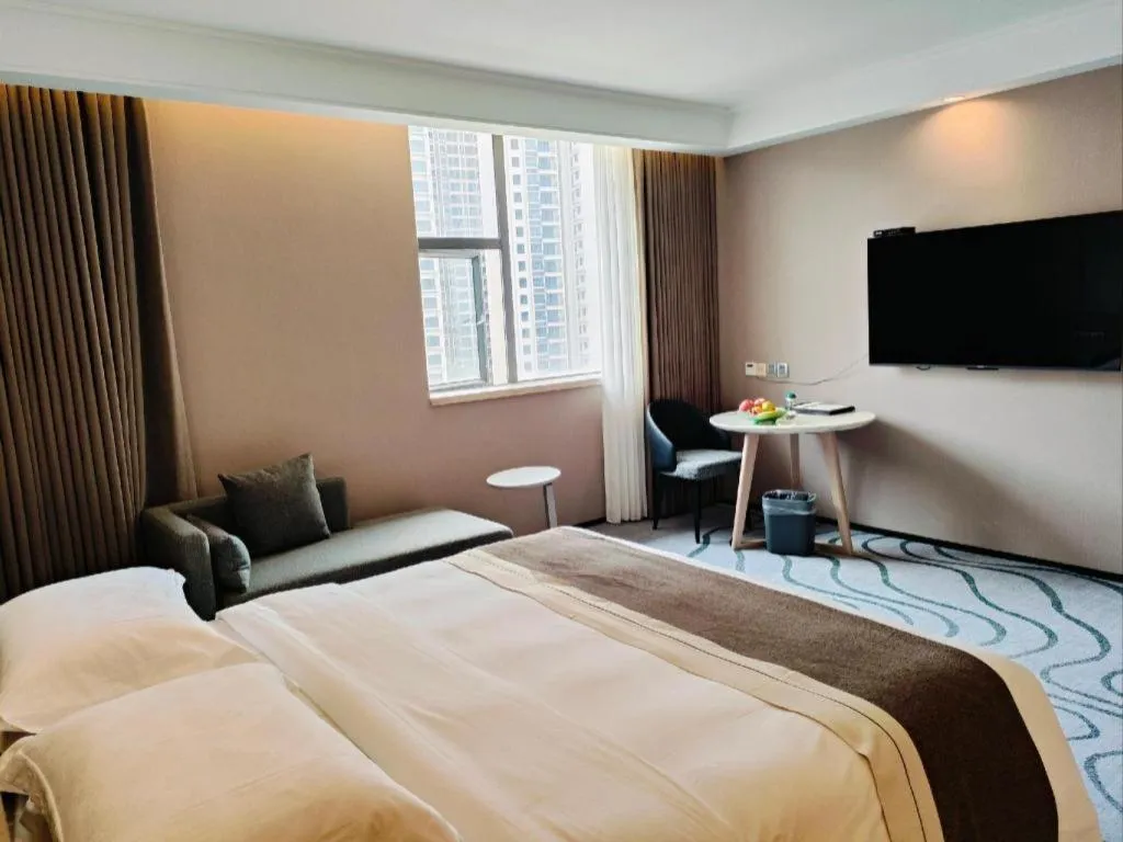 Bed in Centenio International Hotel