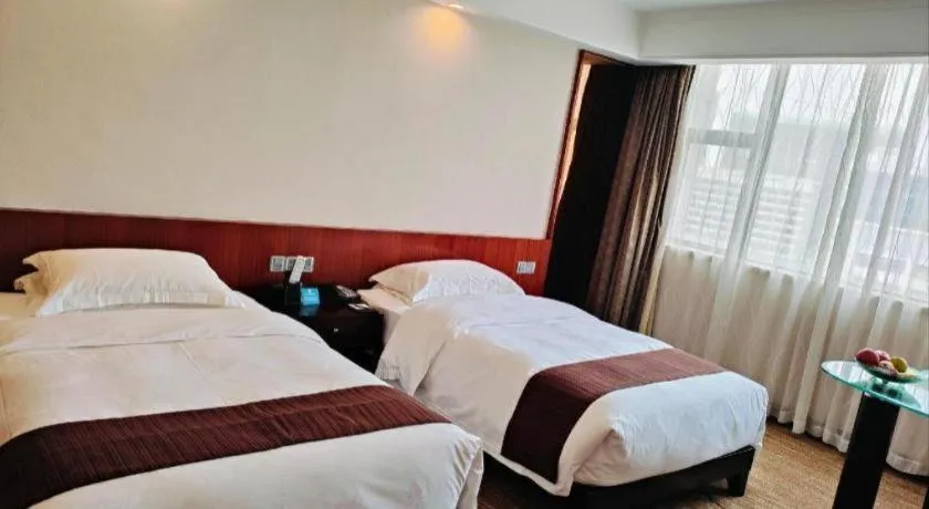 Bed in Centenio International Hotel