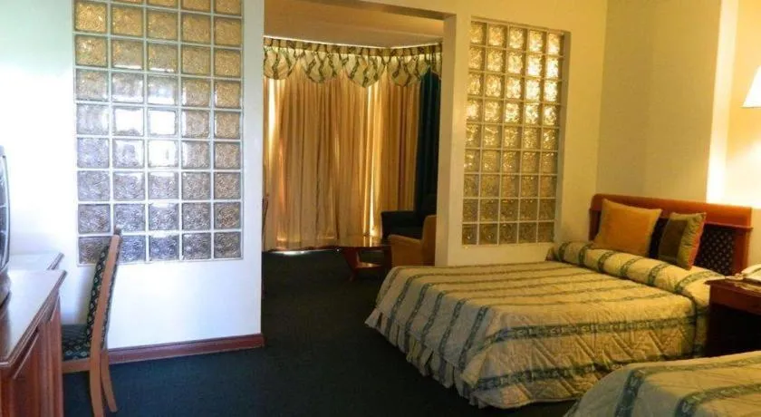 Bed in DJ Paradise Hotel