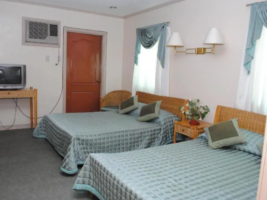 Bed in DJ Paradise Hotel Bed in DJ Paradise Hotel