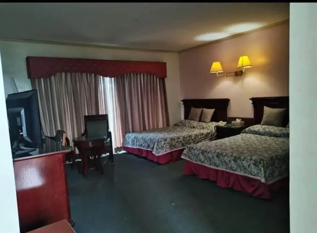 Bed in DJ Paradise Hotel Bed in DJ Paradise Hotel