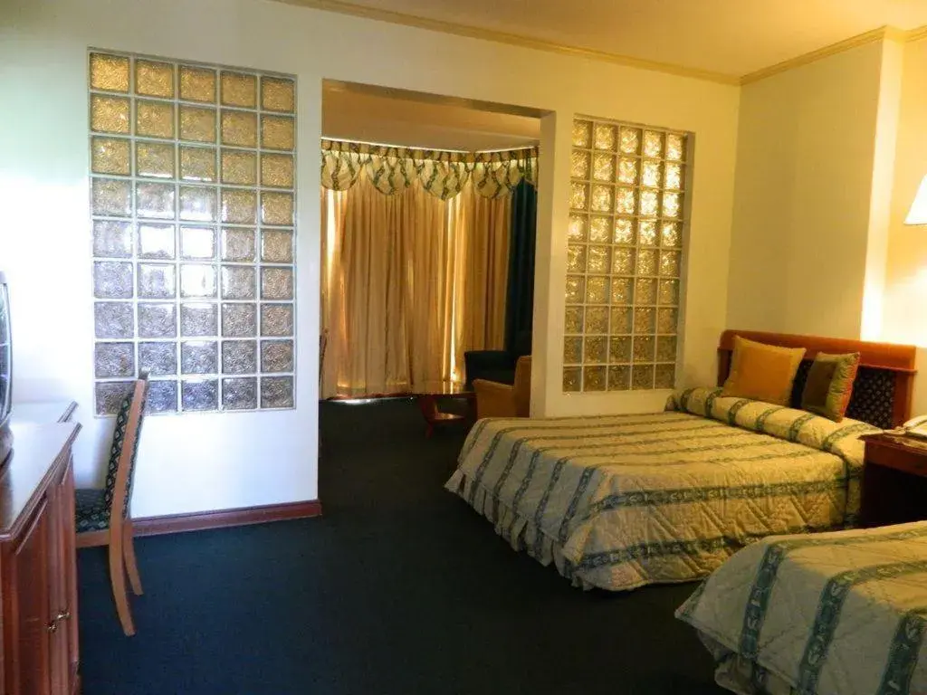 Bed in DJ Paradise Hotel Bed in DJ Paradise Hotel