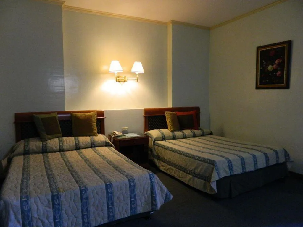 Bed in DJ Paradise Hotel