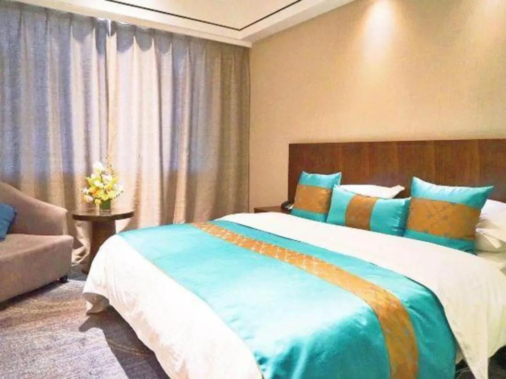 Bed in Kunming Zhong Huang Hotel