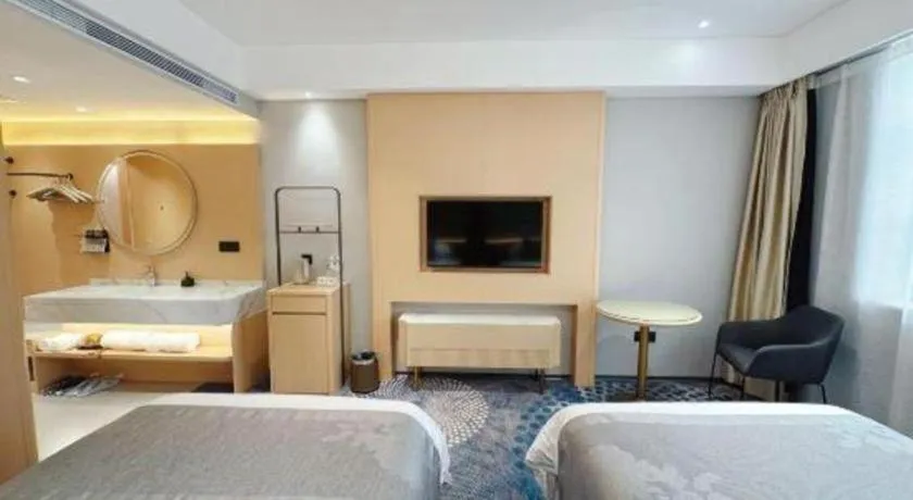 Bed in Kunming Zhong Huang Hotel