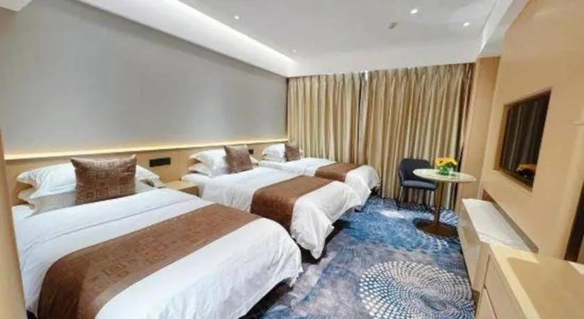 Bed in Kunming Zhong Huang Hotel