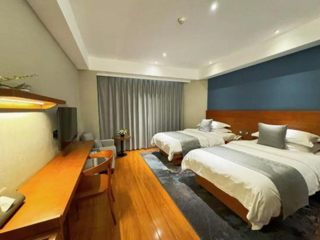 Bed in Kunming Zhong Huang Hotel