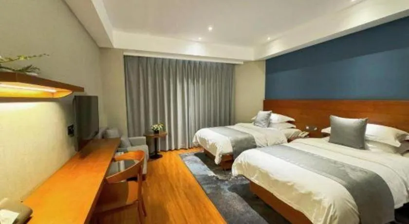 Bed in Kunming Zhong Huang Hotel