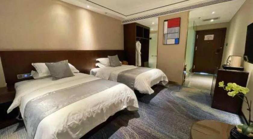 Bed in Kunming Zhong Huang Hotel