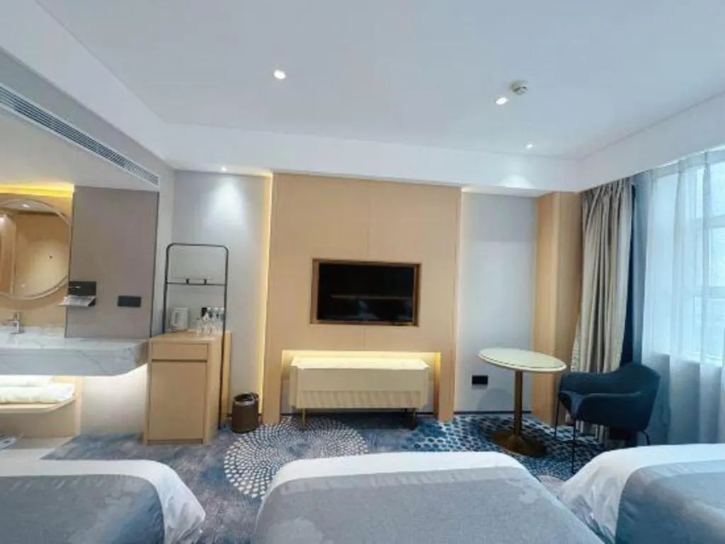 Bed in Kunming Zhong Huang Hotel