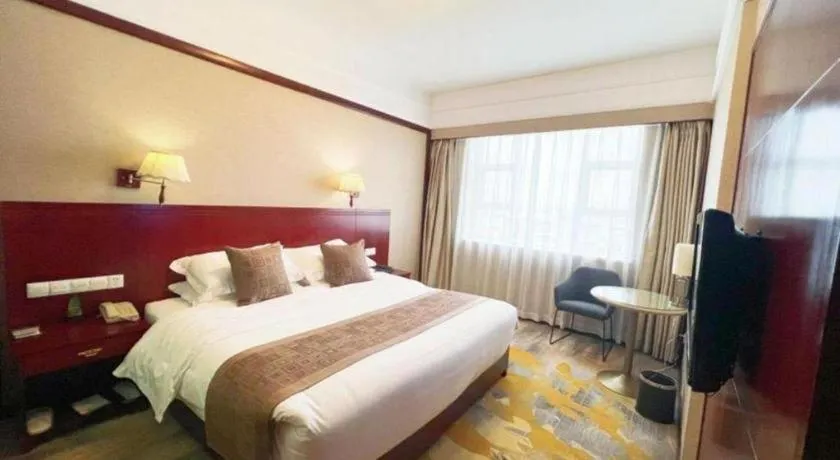 Bed in Kunming Zhong Huang Hotel