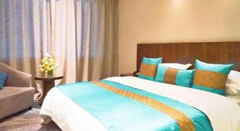 Bed in Kunming Zhong Huang Hotel