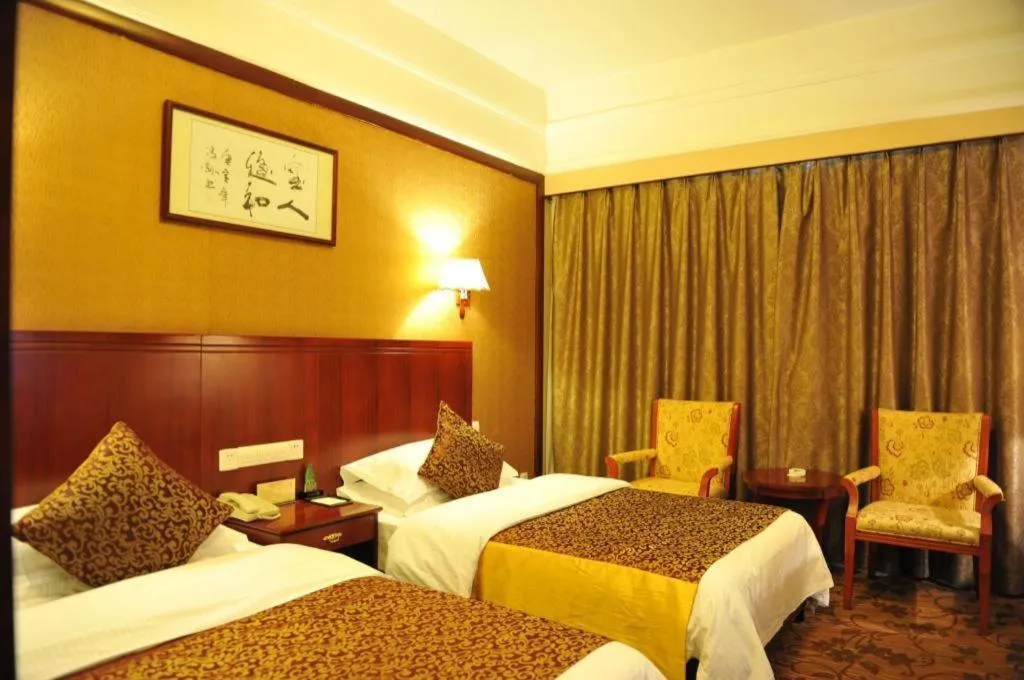 Bed in Kunming Zhong Huang Hotel