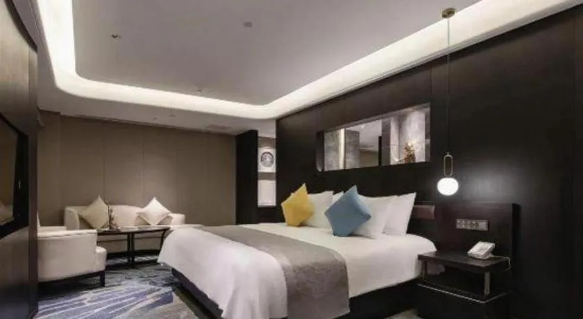 Bed in Kunming Zhong Huang Hotel