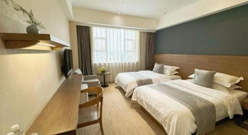 Bed in Kunming Zhong Huang Hotel